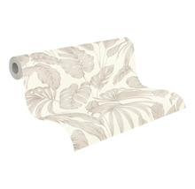 Vliesbehang met tropisch bladerpatroon, monstera en palmbladeren.