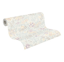 Vliesbehang met floraal patroon van bloemen en bladeren, gedeeltelijk uitgerolde behangrol.