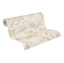 Vliesbehang met bloemen- en bladerpatroon, gedeeltelijk uitgerolde behangrol.