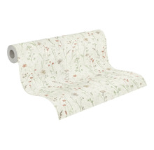 Vliesbehang met verfijnd patroon van wilde bloemen, afgebeeld als een rol.