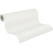 Gedeeltelijk afgerolde witte behangrol met gestructureerde pleisterlook.