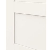 Detailopname van een wit deurblad met paneelstructuur.