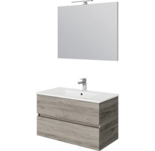 Badkamermeubelset met wastafelonderkast in houtlook, twee lades, witte wastafel en spiegel met verlichting.