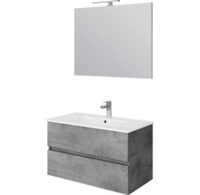 Moderne badmeubelset met grijze onderkast in betonlook, witte wastafel, kraan en spiegel met ledverlichting.