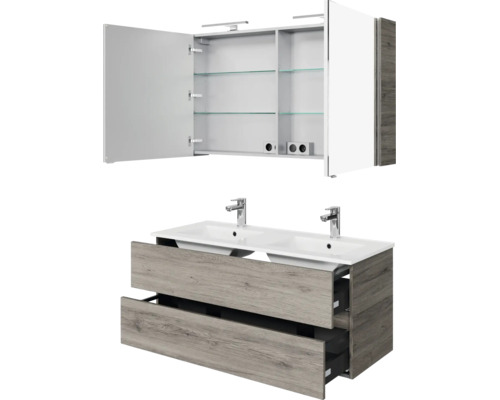 Badkamermeubelset met dubbele wastafel, onderkast met twee laden in houtlook en spiegelkast met glazen planken en verlichting.