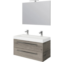 Wandhangend badmeubelset met dubbele wastafel, onderkast in eikenlook met twee laden, grote spiegel en opzetverlichting.