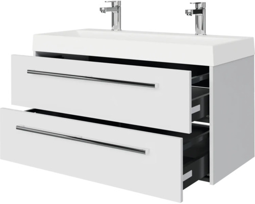 Witte wastafelmeubel met dubbele wastafel, twee laden en twee verchroomde kranen.