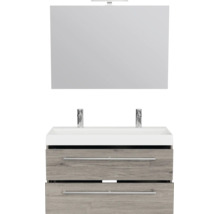 Badkamermeubelset met dubbele wastafel, onderkast in houtlook met twee laden en spiegel met verlichting.