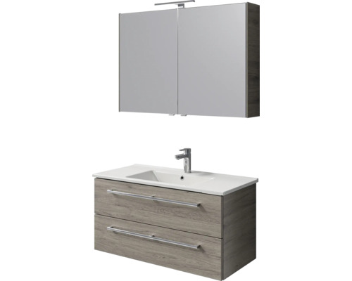 Badkamermeubelset: spiegelkast met lamp, wastafelonderkast in grijs houtlook met twee laden en witte wastafel met kraan.