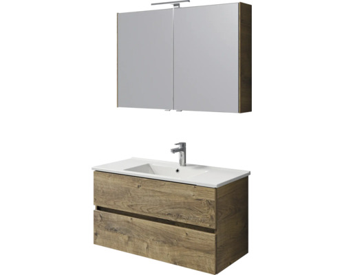 Badkamermeubelset bestaande uit een wastafelonderkast in houtlook met twee laden, witte wastafel met kraan en spiegelkast met verlichting.