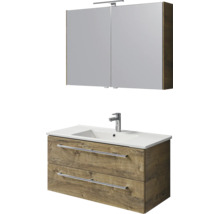 Badkamermeubelset met spiegelkast inclusief verlichting en wastafelonderkast in eikenlook met witte wastafel en kraan.
