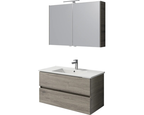 Badkamermeubelset met spiegelkast inclusief verlichting en wastafelonderkast met wastafel en kraan in houtlook.