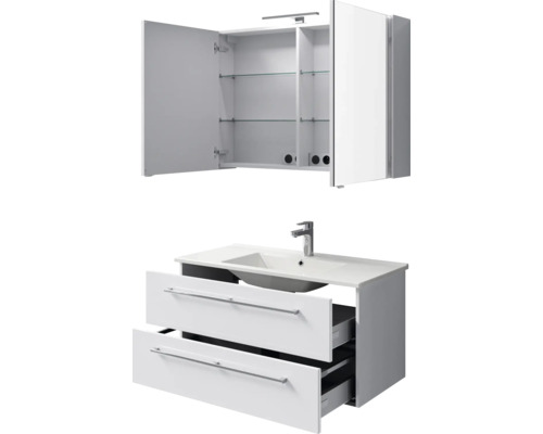 Moderne badkamermeubelset bestaande uit een witte wastafelonderkast met twee laden, keramische wastafel en een spiegelkast.