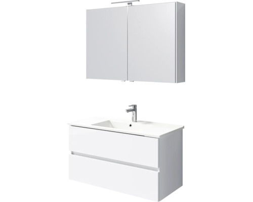 Witte badkamermeubelset: spiegelkast met verlichting, wastafelonderkast met twee laden, wasbak en kraan.