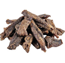 Gedroogde vleesstrips als hondensnack en kauwartikel.