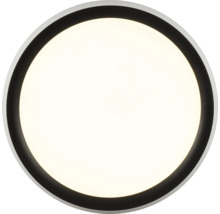 Ronde plafondlamp met een zwart frame.