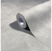 Rol vliesbehang met betonlook en een gestructureerd oppervlak voor wandafwerking.