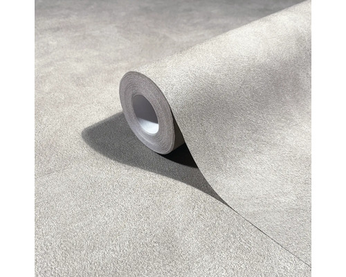 Rol gestructureerd vliesbehang met een fijne oppervlakte-afwerking in grijze betonlook.
