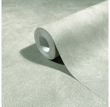 Rol gestructureerd vliesbehang in lichtgroene betonlook.