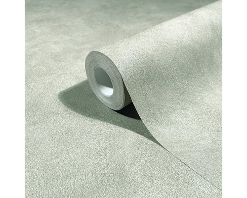 Rol gestructureerd vliesbehang in lichtgroene betonlook.