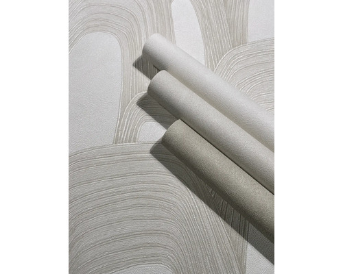 Drie rollen vliesbehang met abstract patroon van gebogen lijnen op een behangen oppervlak.