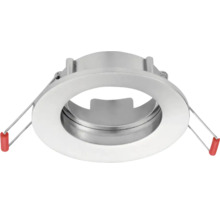 Ronde metalen inbouwspot met montageveren voor plafondinstallatie.