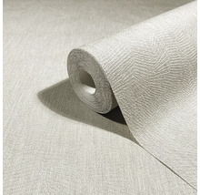 Rol gestructureerd vliesbehang met visgraatpatroon in een neutrale kleur.