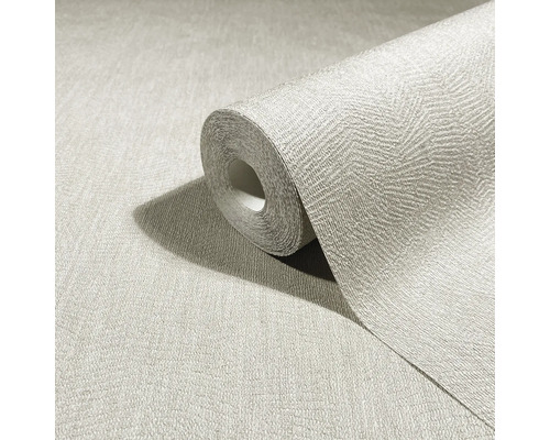Rol gestructureerd vliesbehang met visgraatpatroon in een neutrale kleur.