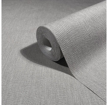 Rol gestructureerd behang met visgraatpatroon.