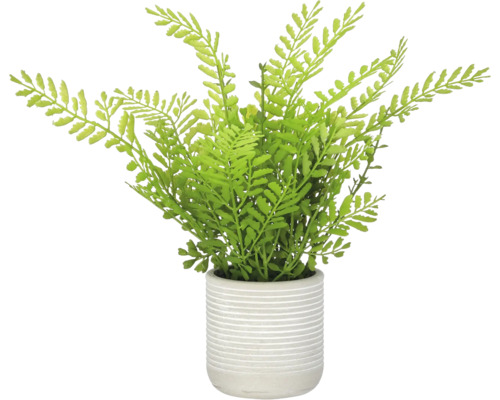 Kunstvaren in een geribbelde keramieken plantenpot als kamerplant voor decoratie