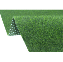 Groen kunstgras tapijt met drainagenoppen aan de onderzijde.