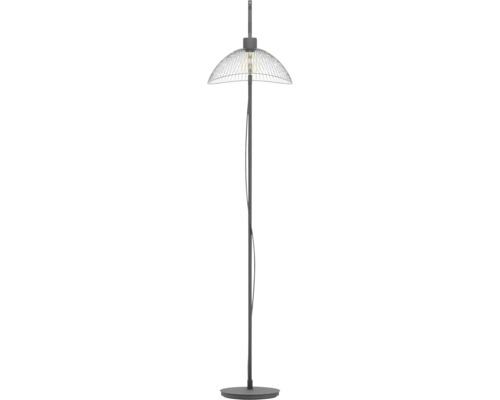 Vloerlamp met kap van draadvlechtwerk en zichtbare lichtbron op een slanke voet.
