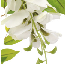 Kunstmatige blauweregen met witte textielbloemen en groene bladeren.