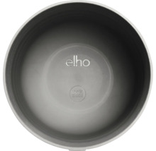 Binnenaanzicht van een ronde plantenpot met Elho Logo en het zegel voor 100 procent gerecycled en recyclebaar materiaal.