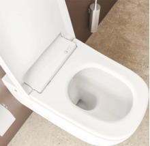 Bovenaanzicht van een modern, wit, randloos wandcloset met douchefunctie van VitrA V-care met open deksel in een badkamer.