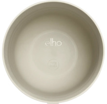 Bovenaanzicht van een ronde kunststof plantenpot met elho Logo en de vermelding 100 procent recyclebaar.