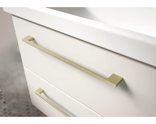 Witte wastafelonderkast met twee laden en smalle, goudkleurige metalen handgrepen.