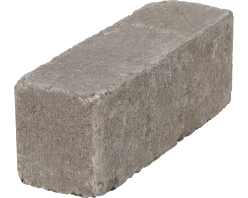 Een enkele grijze betonsteen voor tuinmuren of bestrating
