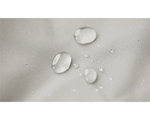 Waterdruppels op een waterafstotende textielstof.