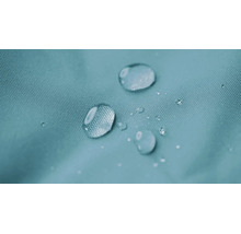Waterdruppels op een waterafstotend weefseloppervlak met pareleffect.