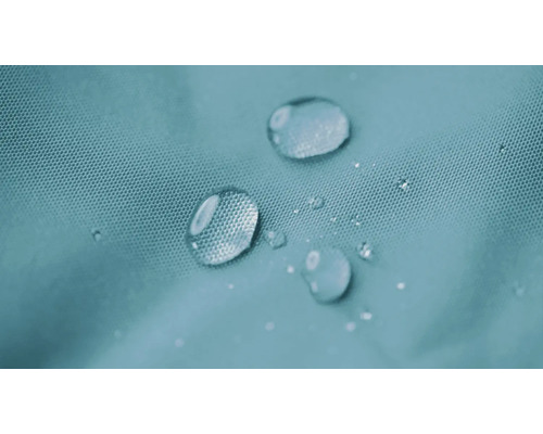 Waterdruppels op een waterafstotend weefseloppervlak met pareleffect.