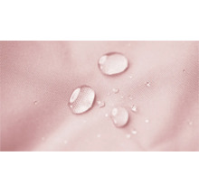 Waterdruppels parelen op een waterafstotend textieloppervlak.