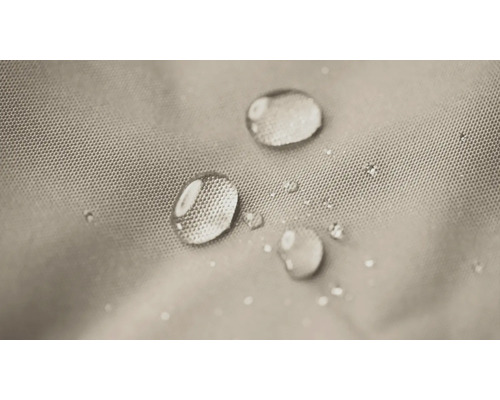 Close-up van waterdruppels op een waterafstotend textielweefsel.