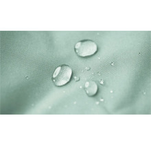 Close-up van waterdruppels op een waterafstotend weefseloppervlak.
