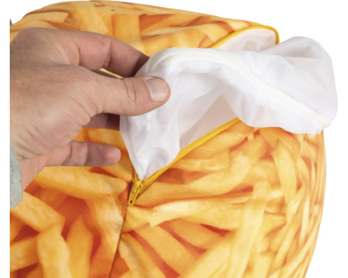 Zitzak met frietprint, detailopname van de ritssluiting en de witte binnenzak.