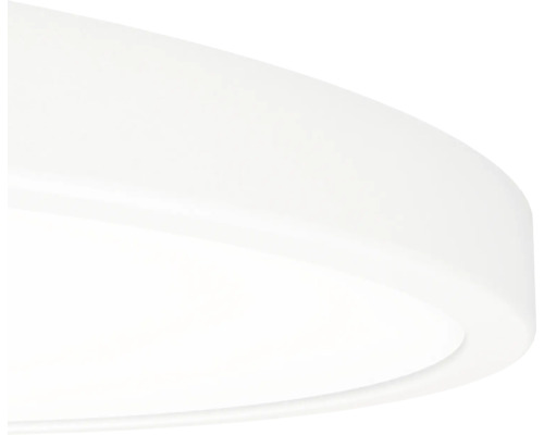 Ronde, platte plafondlamp in het wit met een mat oppervlak.