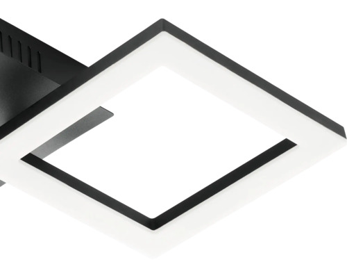 Detail van een moderne vierkante LED-plafondlamp met zwart frame en witte diffuser.