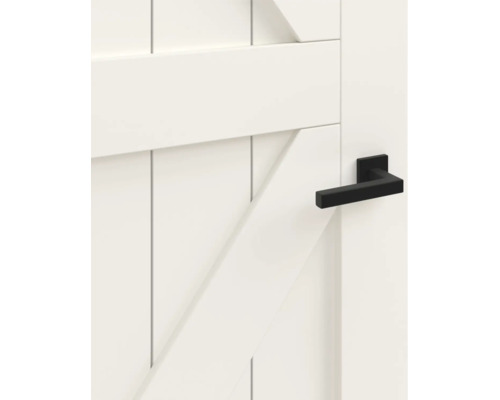 Witte houten staldeur met een moderne zwarte deurkruk in vierkante vorm.