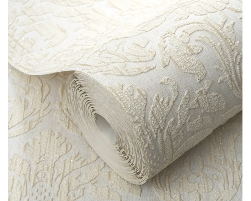Een behangrol met een barok ornamentpatroon, fijne textuur en glittereffect voor een elegante wandafwerking.