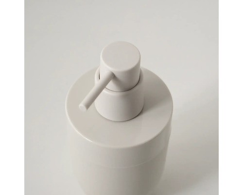 Zeepdispenser van keramiek met pompkop, cilindrische vorm.